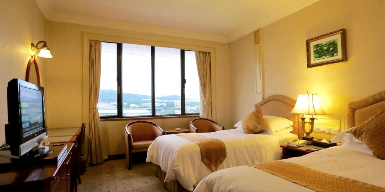 Huiquan Dynasty Hotel Qingdao Exteriör bild